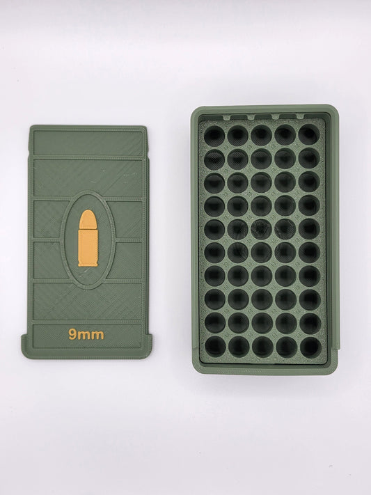 Open olive green 9mm ammo storage box showing 50 empty slots