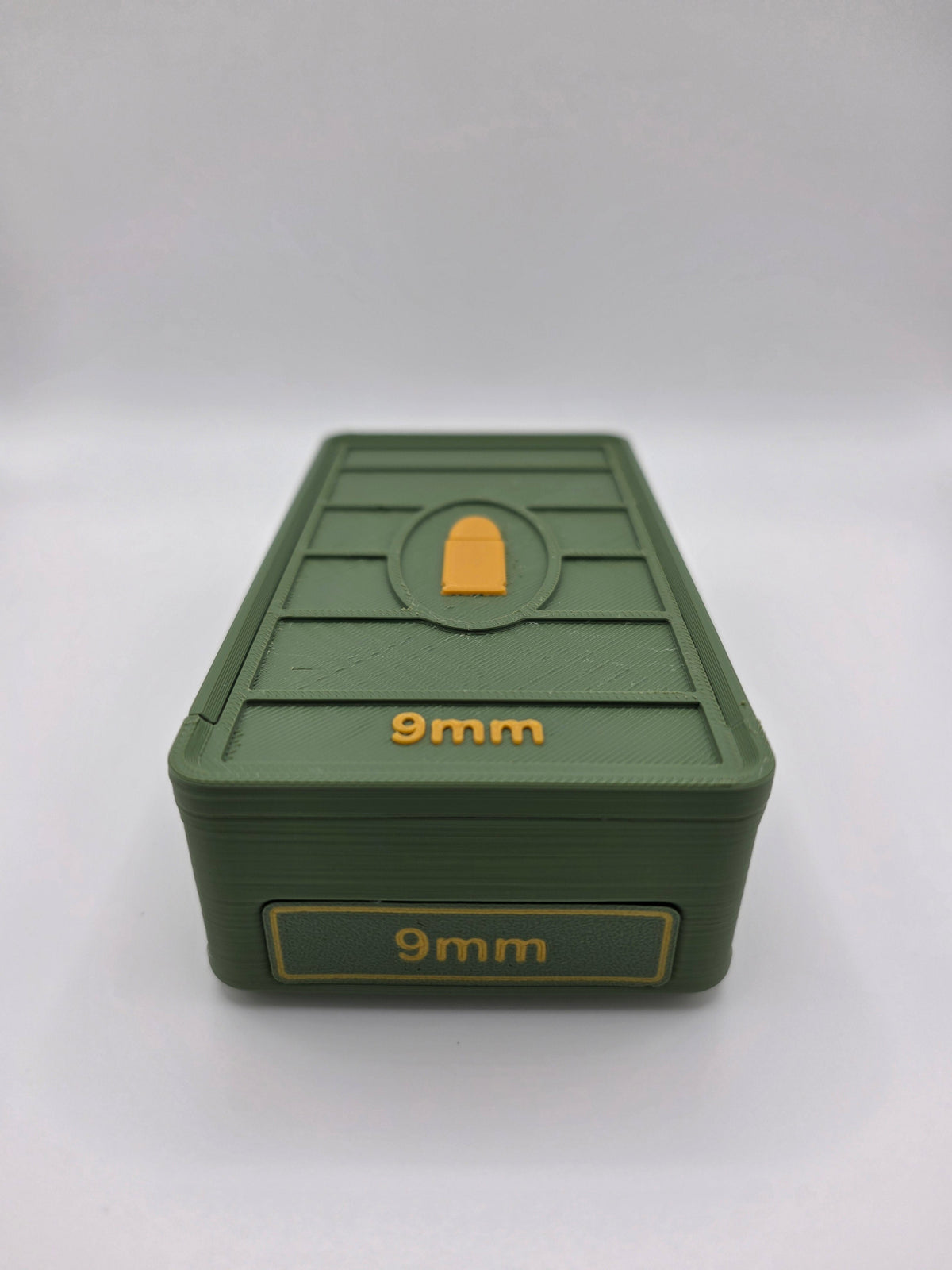 Olive green 3D printed 9mm ammo storage box, front view