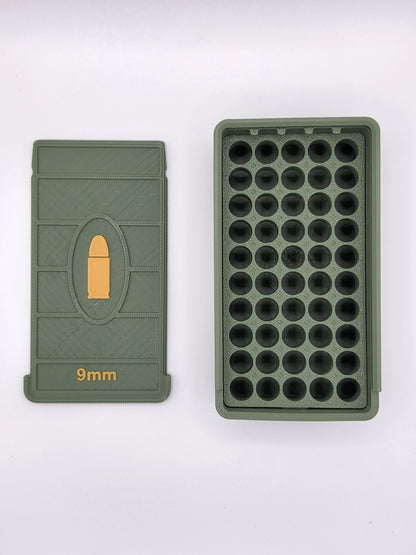 Open olive green 9mm ammo storage box showing 50 empty slots