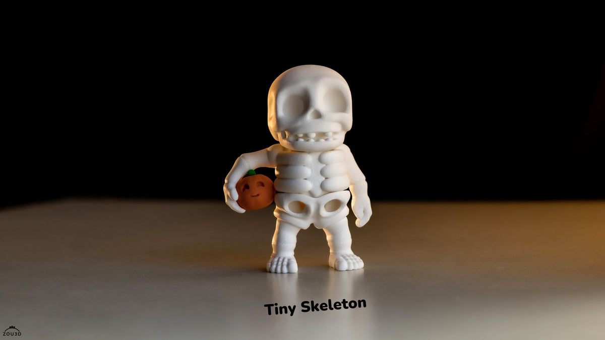 Tiny Skeleton Holding Pumpkin - 3D printed collectible figure, design by ZOU3D