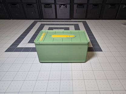Side profile of closed 5.56 NATO ammo storage case showing box depth, lid cartridge icon and 5.56 NATO side text, 3D printed by SquigglePrintz