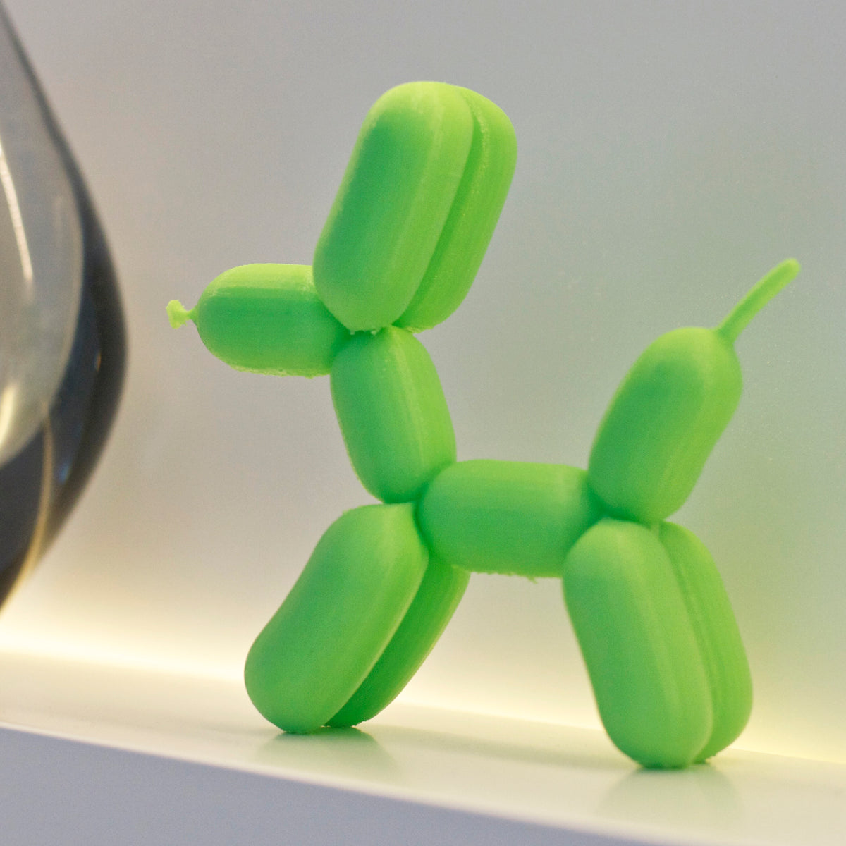 Balloon dog sculpture shown from another angle.