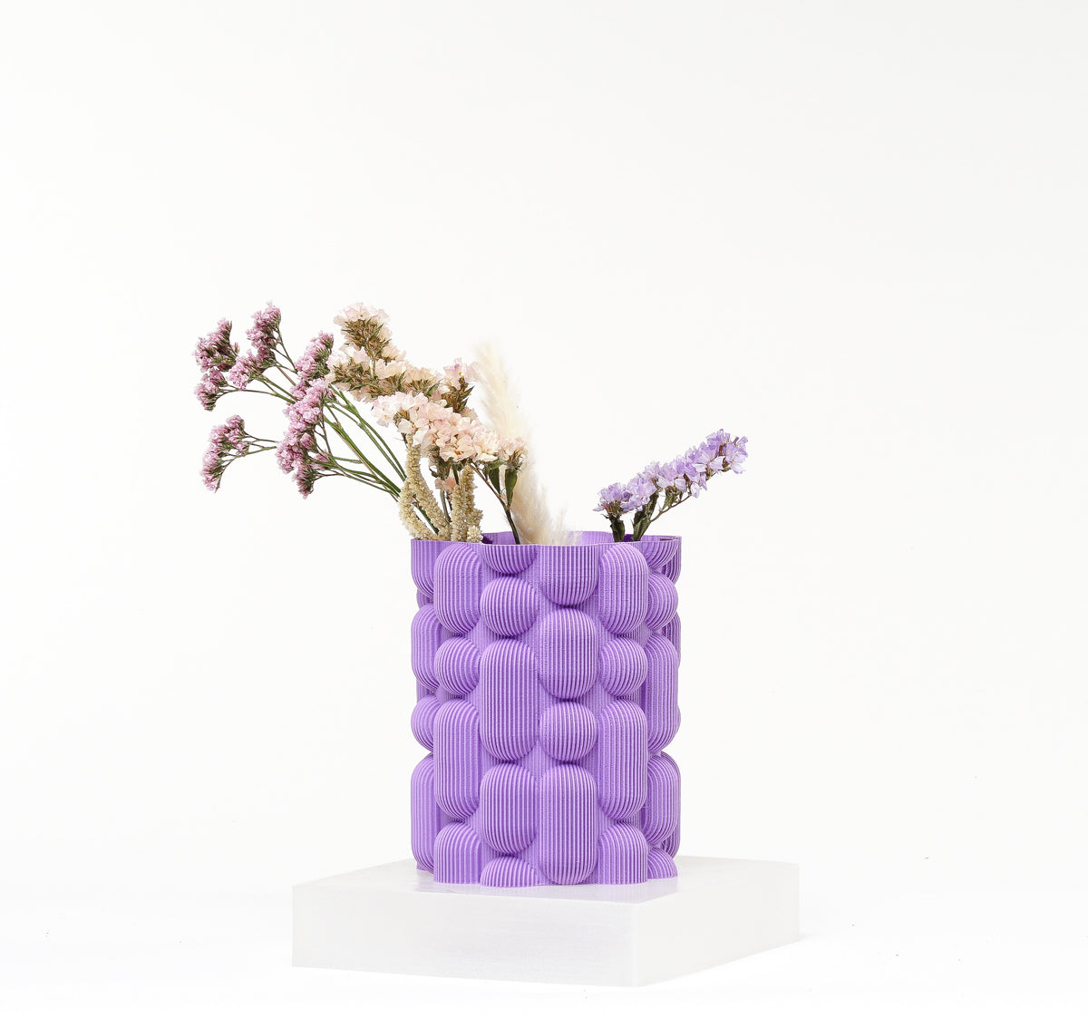 Lava vase with molten flowing surface texture, 3D printed. Design by Kowafatcompany.