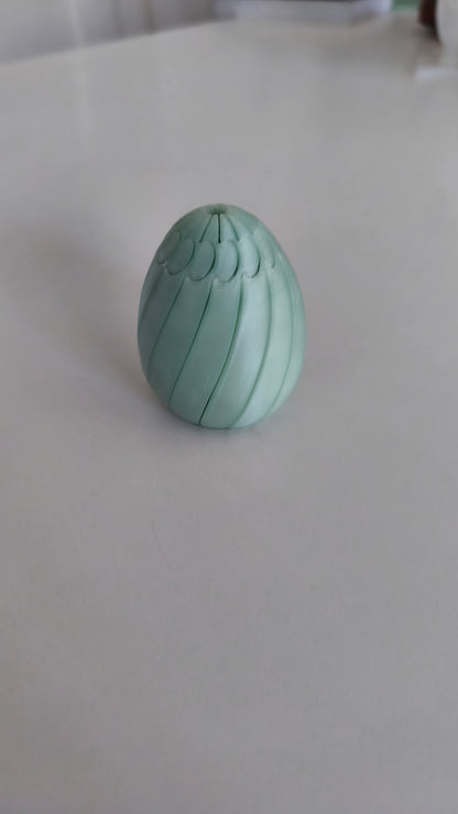 Easter egg slime fidget shown in several colour combinations.