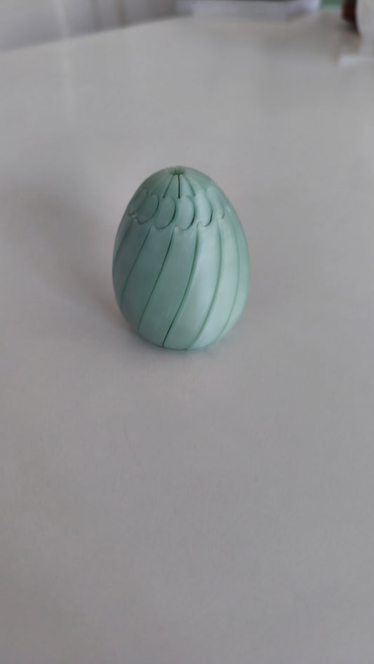 Easter egg slime fidget shown in several colour combinations.