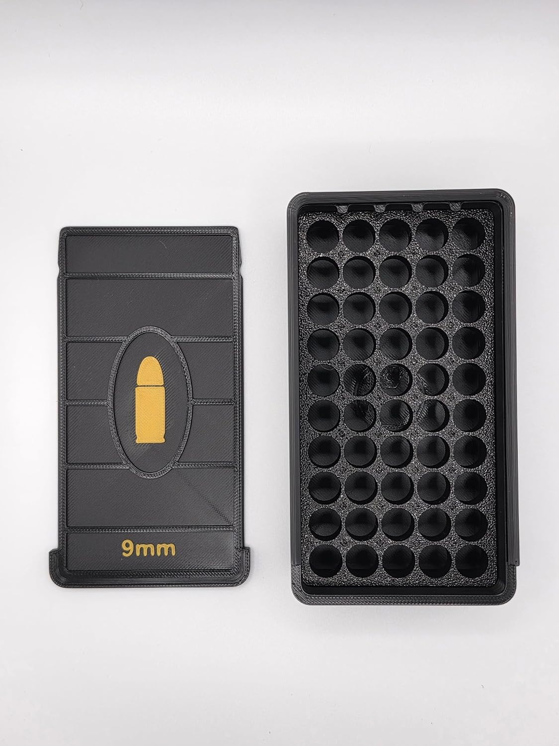 Open Black storage box showing empty cartridge organization slots