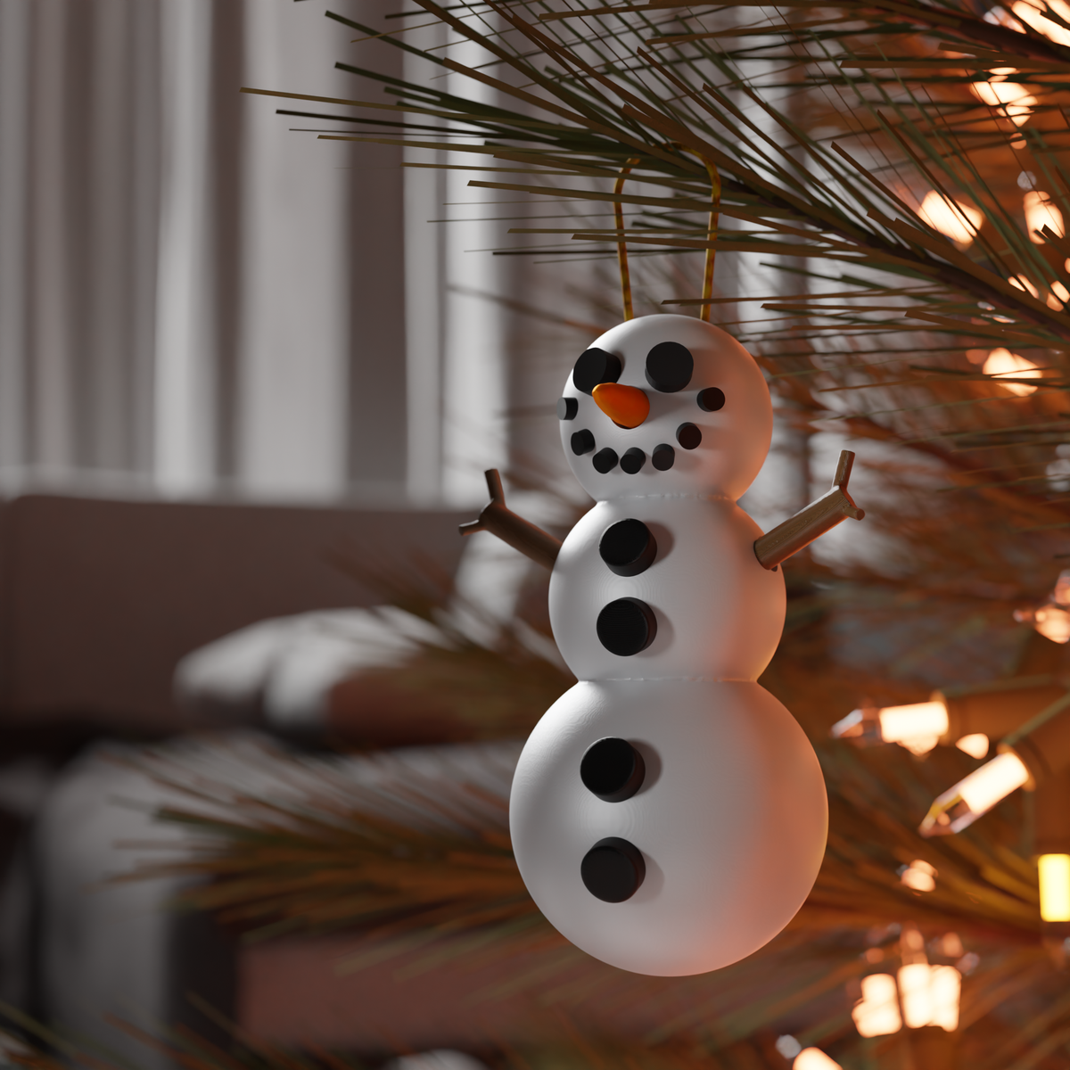 Snowman ornament shown hanging on a tree branch.