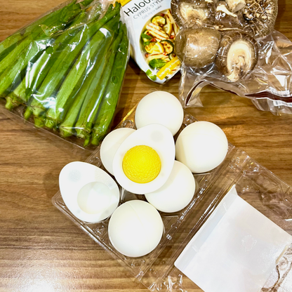 Boiled egg clicker shown from above.